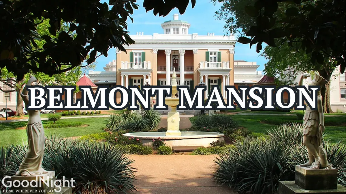 The elegant Belmont Mansion sitting amid manicured gardens, complete with a stately fountain and classical statues. The historic architecture is framed by lush greenery, inviting leisurely strolls and cultural discovery.