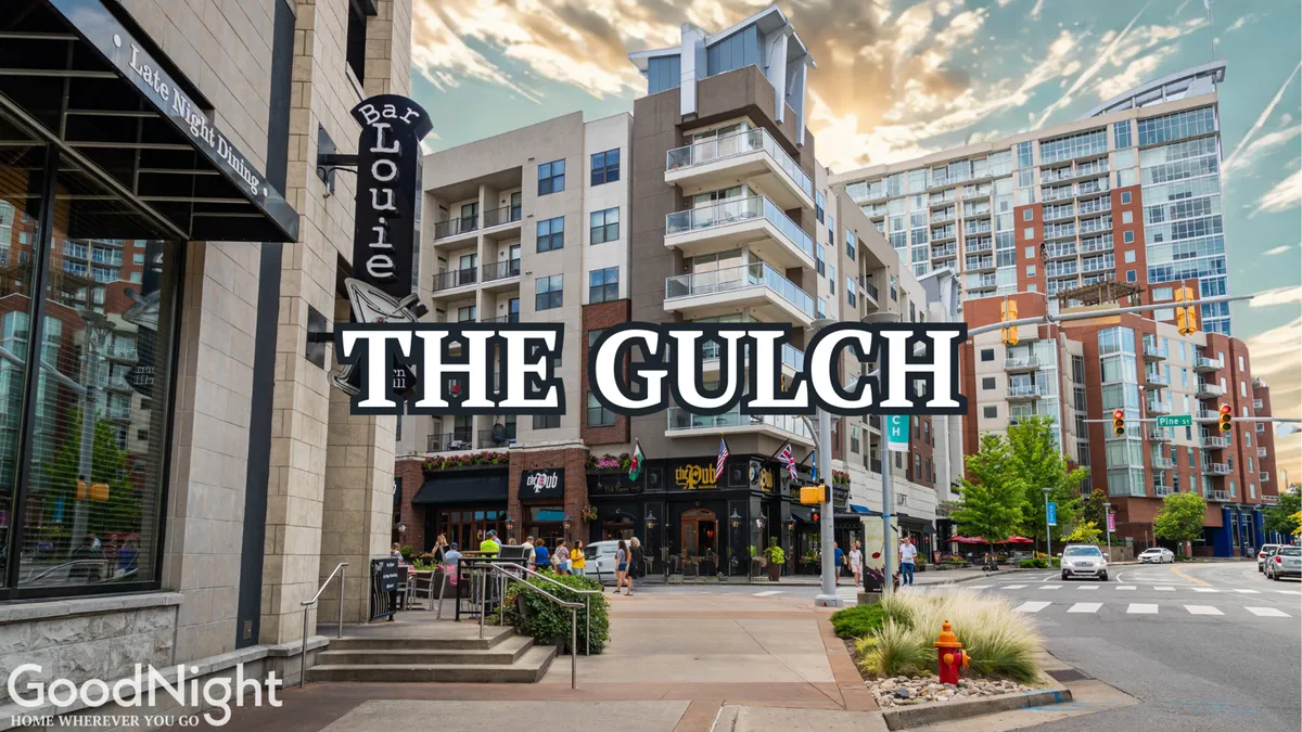 A bustling streetscape featuring the Bar Louie sign, modern apartment buildings, pedestrians strolling, and clear street signage. The scene radiates urban energy and highlights a lively dining and social atmosphere right outside the doorstep.